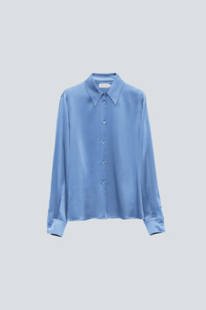 Flat-lay of the blue Vibrant Silk Shirt, featuring a clean front button design and classic collar.