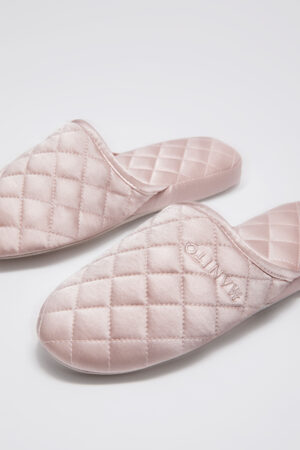 Women's Silk Lounge Shoes in pink with soft fabric and diamond quilting that feel cozy for unwinding at home.