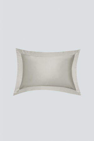 MANITO Authentic Silk Pillowcase Set in gray laid flat, reflecting a calm tone and luxurious silk glow.