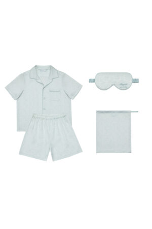 Flat lay of BONPOINT×MANITO Clive Kid's Pajama Set Gift Box including pajama top, shorts, eye mask.