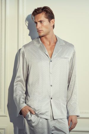 Man in a Classic Monogram Men's Silk Pajama Set exuding timeless style and comfort.