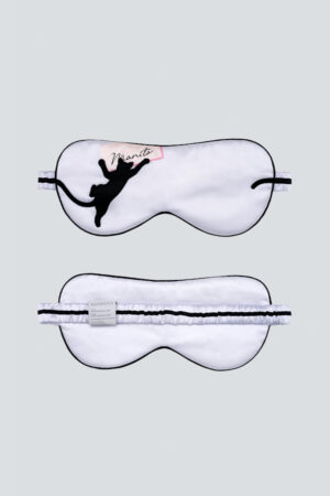 Front and back of white MANITO cat eye mask with extended cat tail design and branded label.