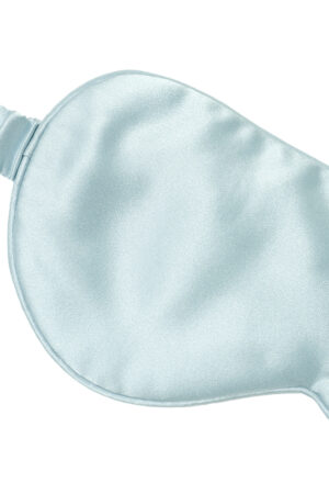 Close-up of Light Eye Mask in blue silk satin, highlighting smooth texture and delicate stitching.