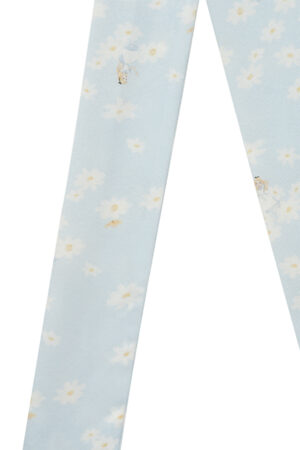 Close-up of blue Alice Daisy Silk Twilly with delicate daisy prints and playful Alice details for a dreamy touch.