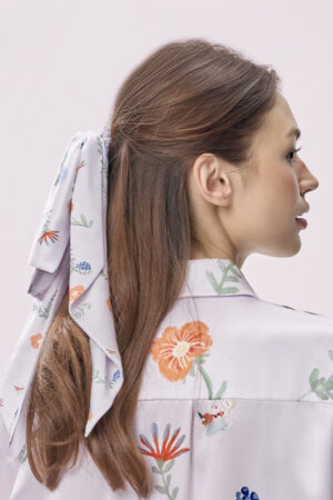 Side close-up of Alice Fantasy Forest Bow Hair Band shows a soft sheen and whimsical florals for daily styling.