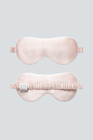 HA Silk Eye Mask in pink shown front and back, blending silky softness with hyaluronic moisture care for gentle beauty sleep.