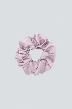 Thick Silk Scrunchie in lilac with plush gathers, offering a gentle, low-tug hold for everyday styling.