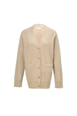 Wunder Cardigan lay flat on neutral fabric, highlighting its relaxed lines and timeless camel tone.