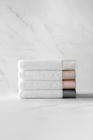 MANITO Brimmy 3 Piece Bath Towel Set in various colors, featuring silk trim details.