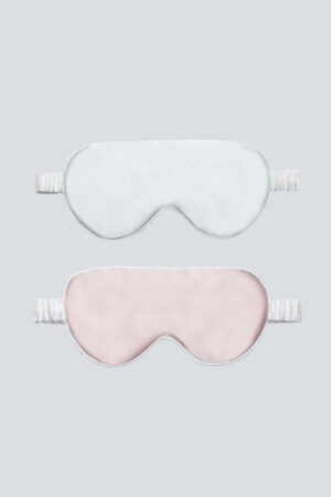 Soft blue and pink silk eye masks for kids with gentle elastic band.